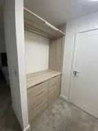 Small open plan wardrobes with drawers, hanging and an motion triggered light, installed in Eaglescliffe